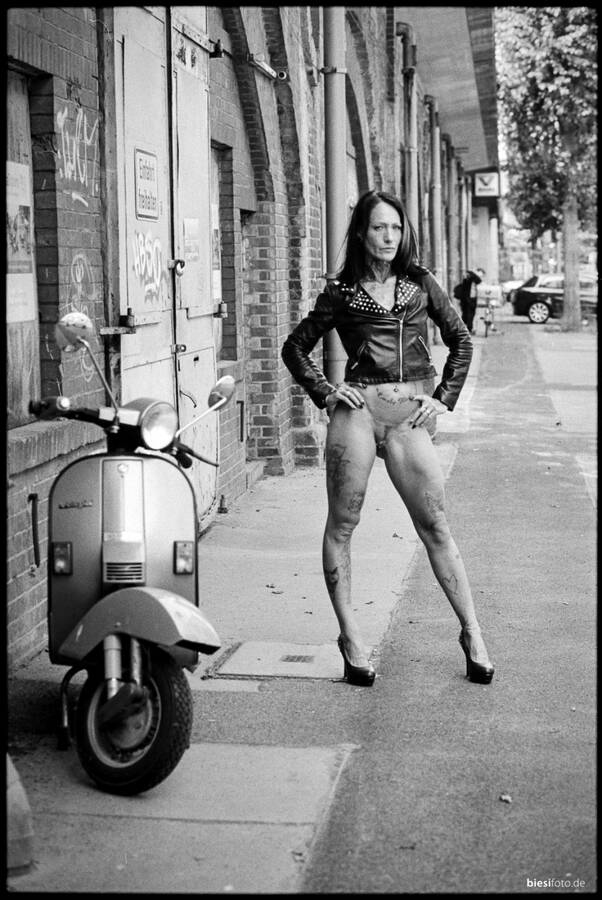 photographer biesifoto uncategorized modelling photo with Not on AdultFolio. reizender bienenstich sans pants at the arches of the sbahn railway in the center of berlin  shot on kodak trix 400 film developed in hc110.