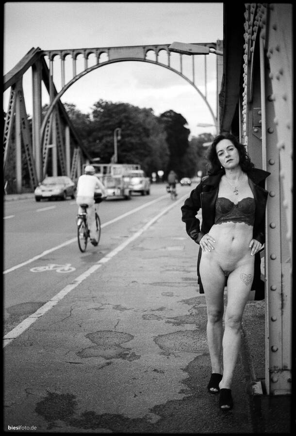 photographer biesifoto nude in public modelling photo. amazing model odette posed bottomless on the glienicker brcke between berlin and potsdam  better known as the bridge of spies where agents were exchanged between east and west during the cold war.