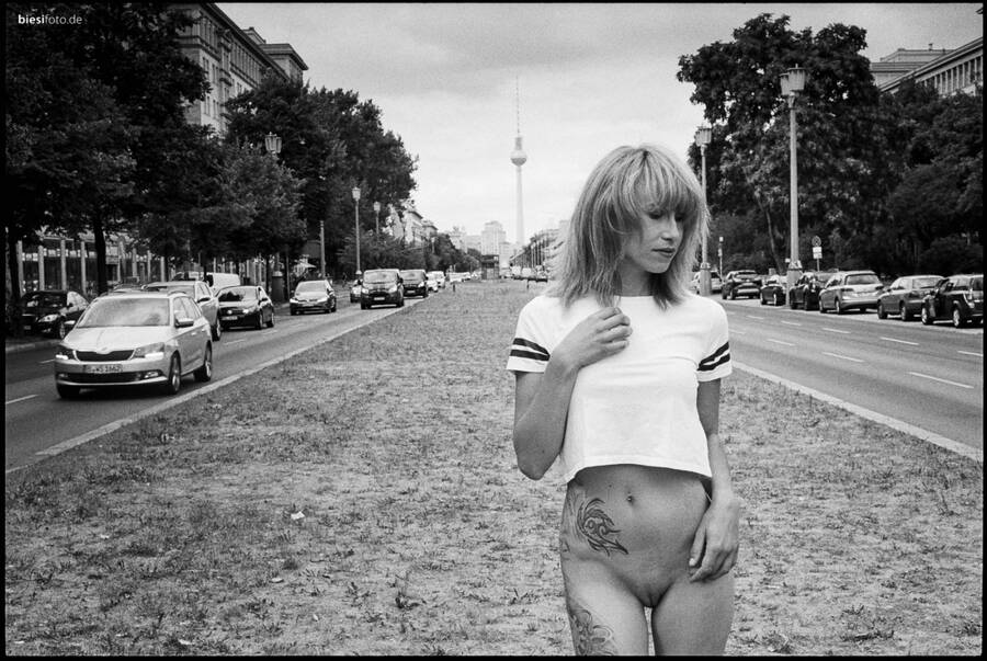 photographer biesifoto art nude modelling photo with Not on AdultFolio. my amazing model o went bottomless in public on the karlmarxallee in berlin  note the iconic fernsehturm tv tower in the background.